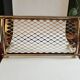 Old brass train luggage rack