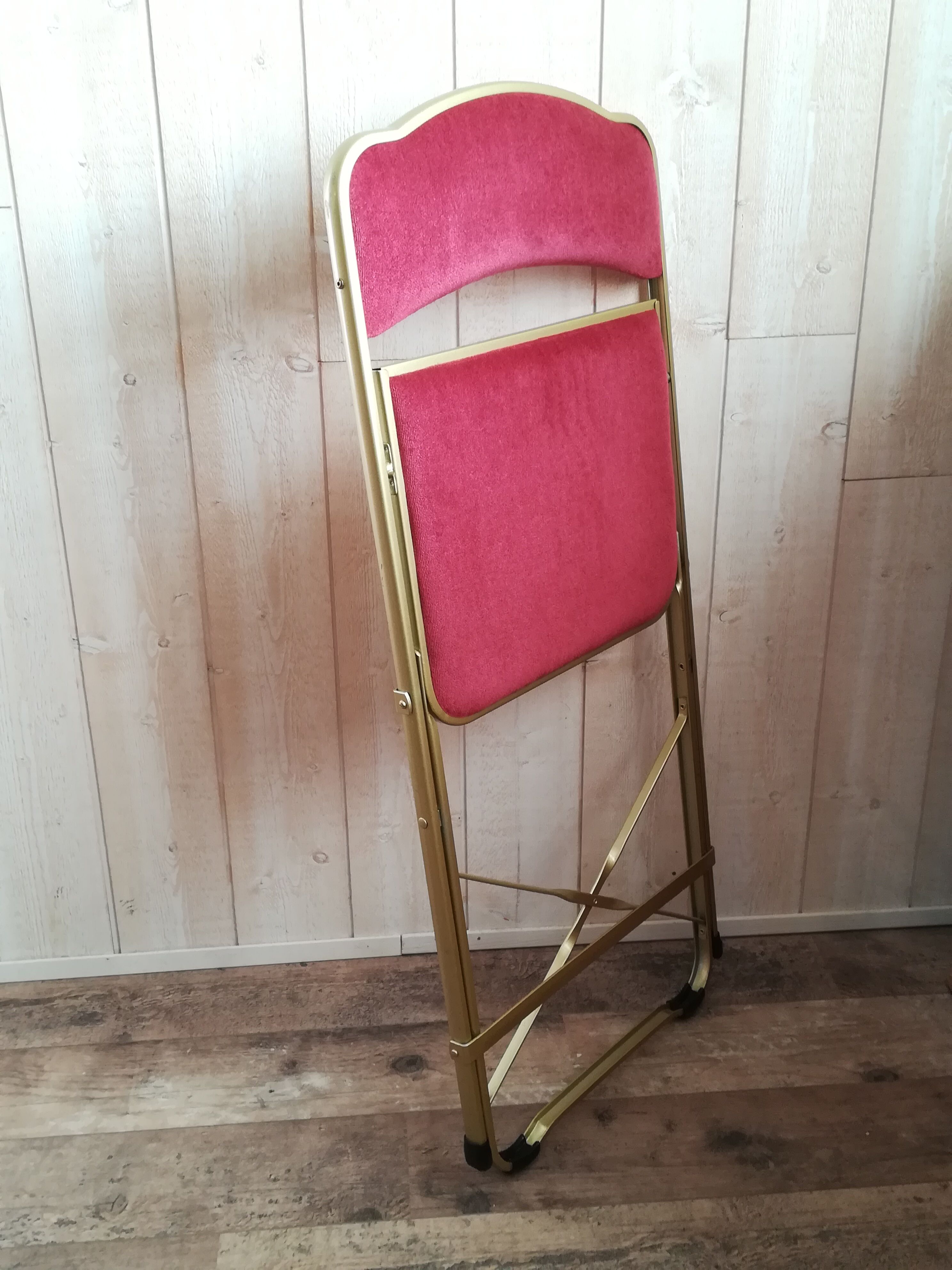 Pink velvet folding chair