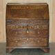 Ancient Georgian writing desk circa 1760 with a leather top.