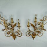 Pair of large floral wall lamps in gilded and lacquered metal. Italy 1960s