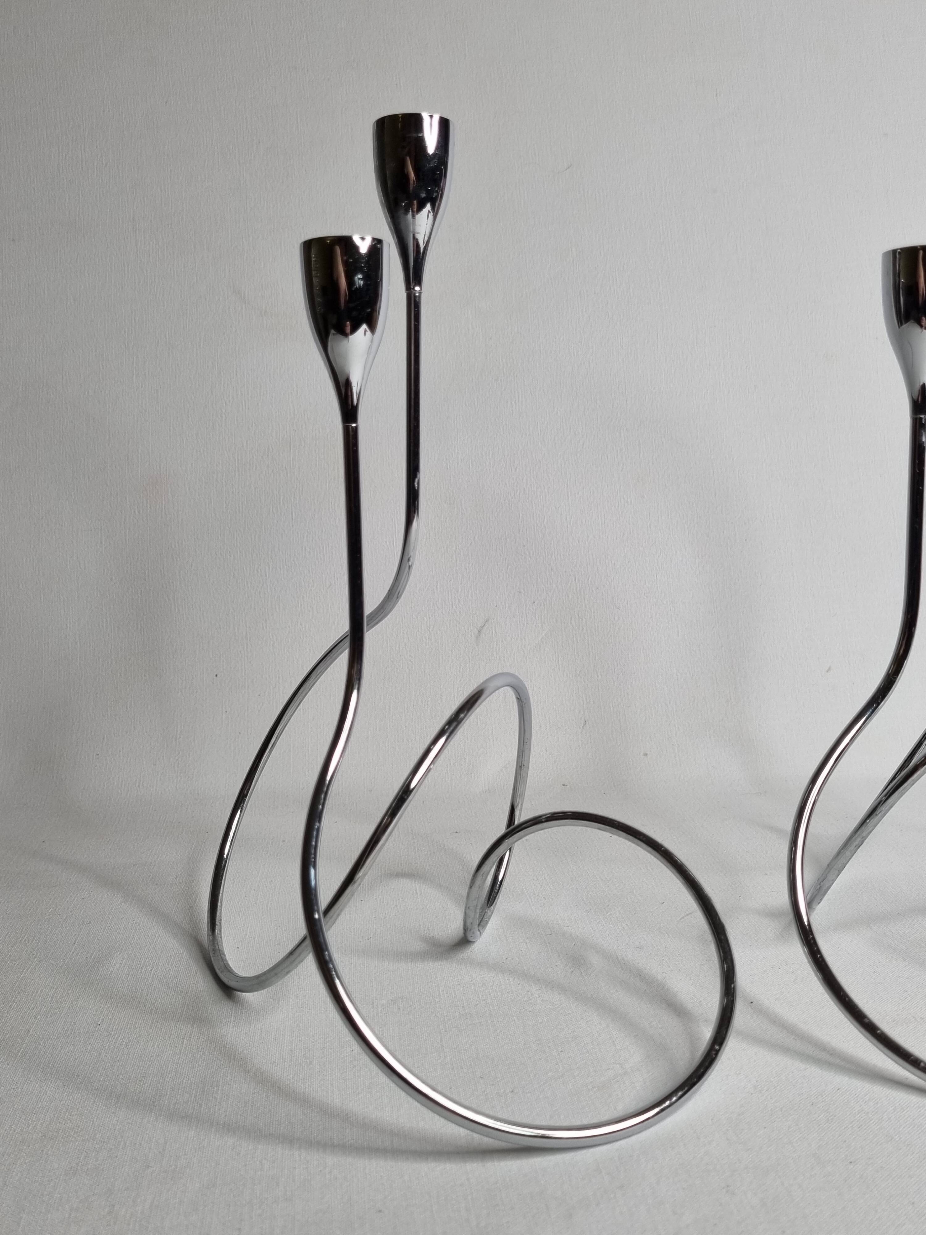 Pair of “Black & Blum” designer candlesticks in chrome-plated metal, 27 cm