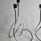 Pair of “Black & Blum” designer candlesticks in chrome-plated metal, 27 cm