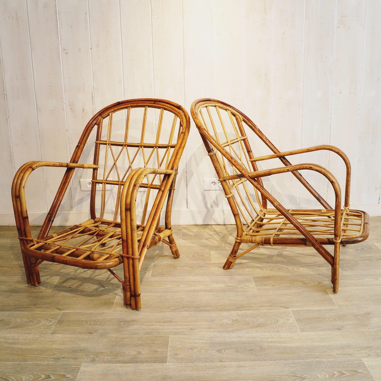Pair of rattan chairs Audoux & Minnet 1960