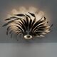 Silver wrought iron sunburst wall light from the 1960s.