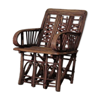 Fauteuil artisanal en rotin et palmier, circa 1950
