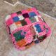 Berber floor pouf: Handwoven Moroccan wool cushion.