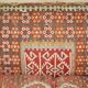 Vintage three-seater canapé by George Smith upholstered in Kilim with feather cushions.