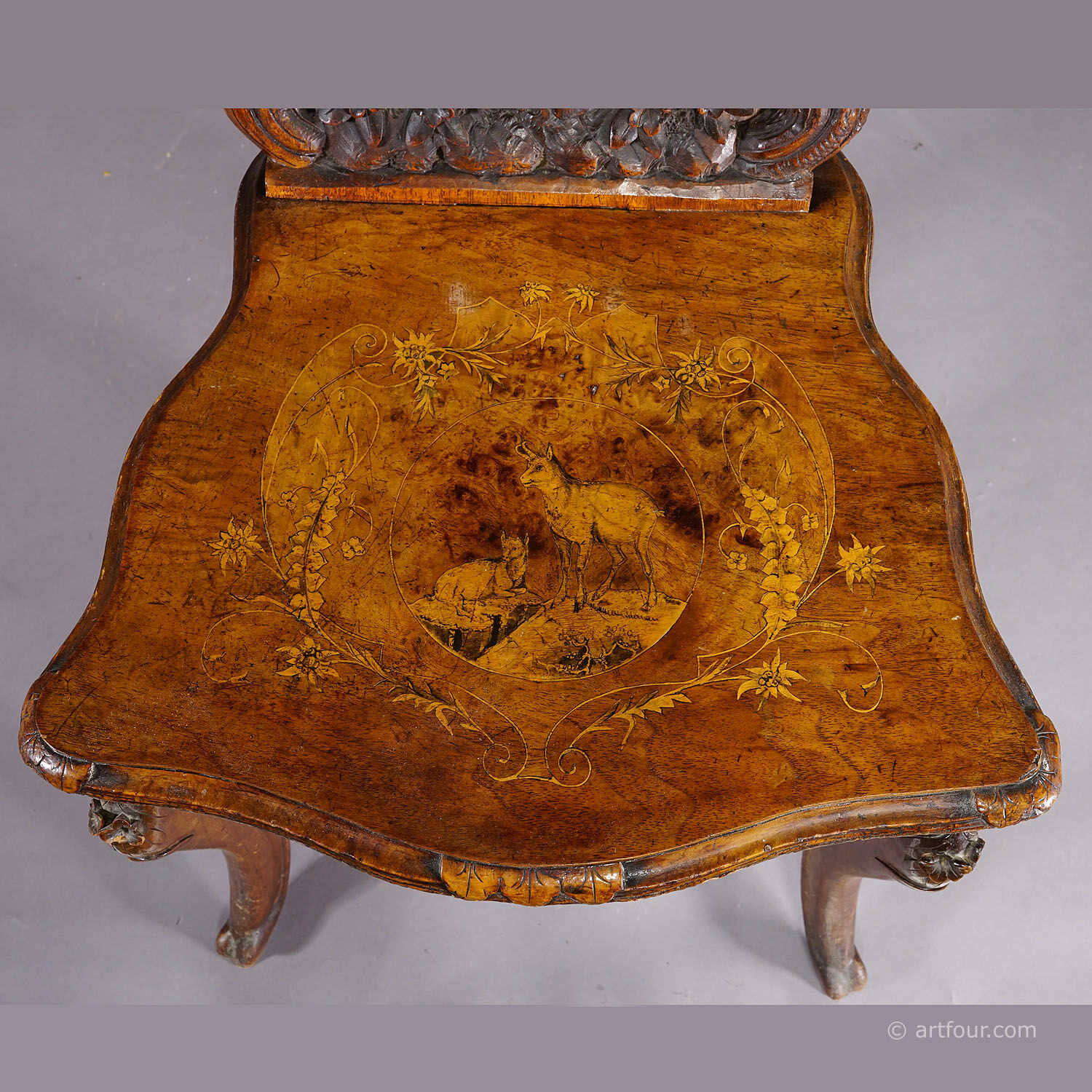 Pair of walnut chairs with Edelweiss marquetry, Brienz Switzerland 1900