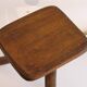 Patinated tripod stool in solid wood from the 1960s.