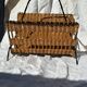 Vintage metal and wicker magazine rack