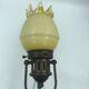 Decorative glass and metal wall light