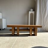 Banc en bois massif piètement ajouré traversé par un cylindre - Teck
