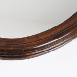 Large old oval wooden mirror