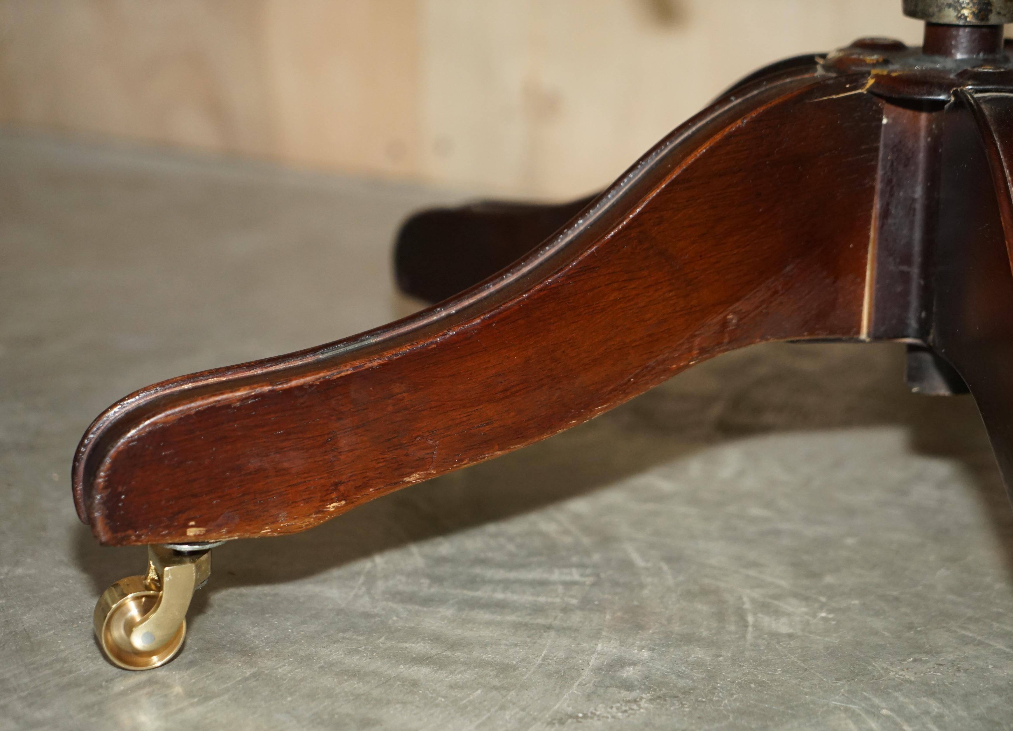 Vintage Chesterfield captain's chair in leather