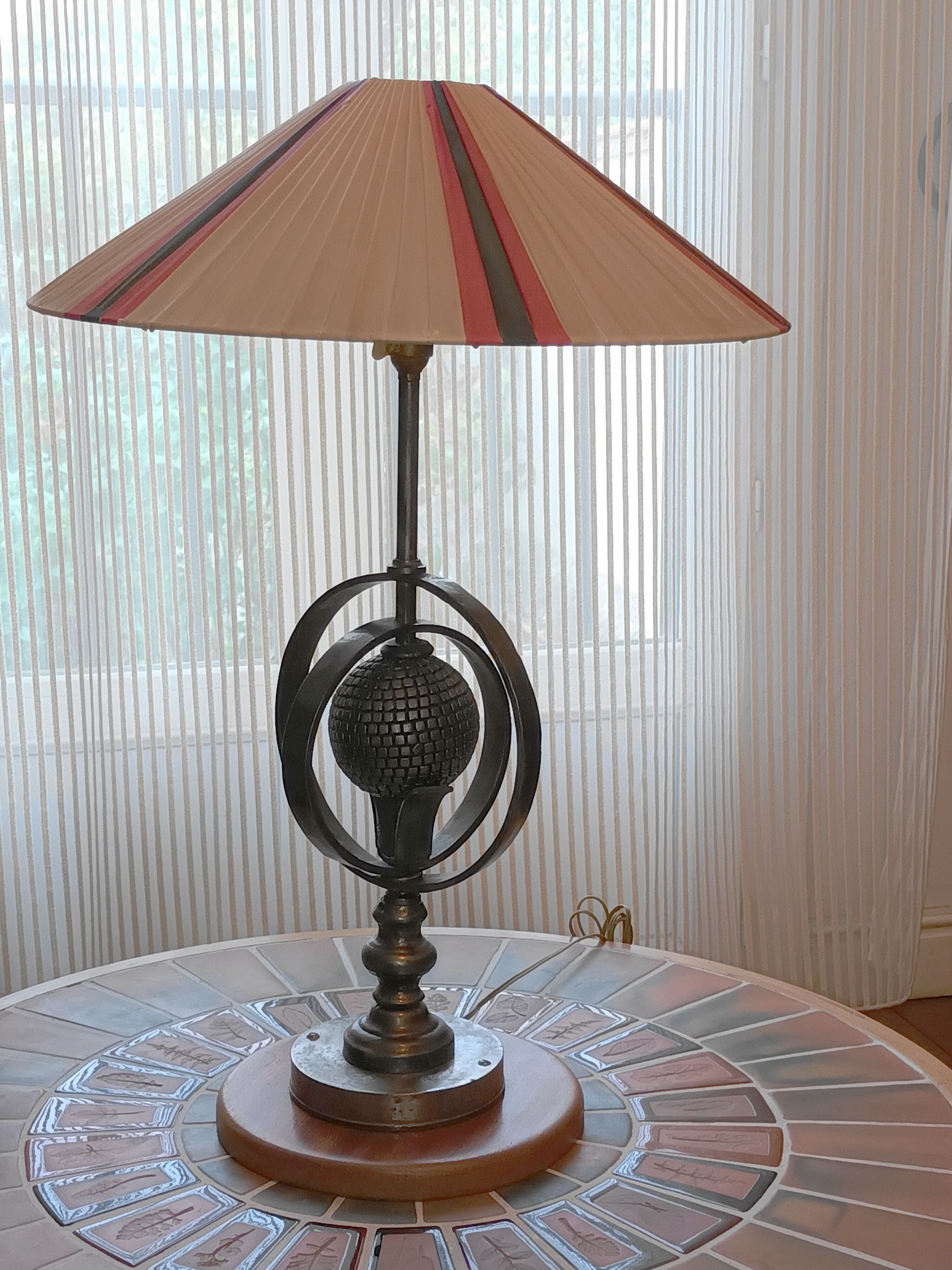 Wrought iron lamp with armillary sphere decorations
