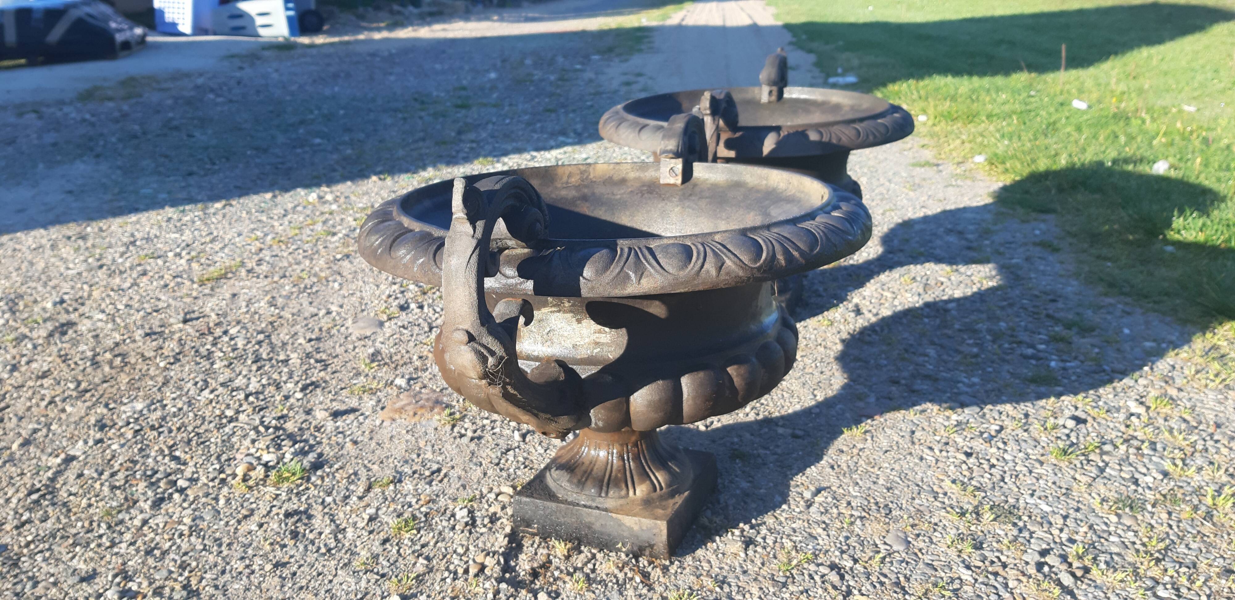 Pair of cast ear vases