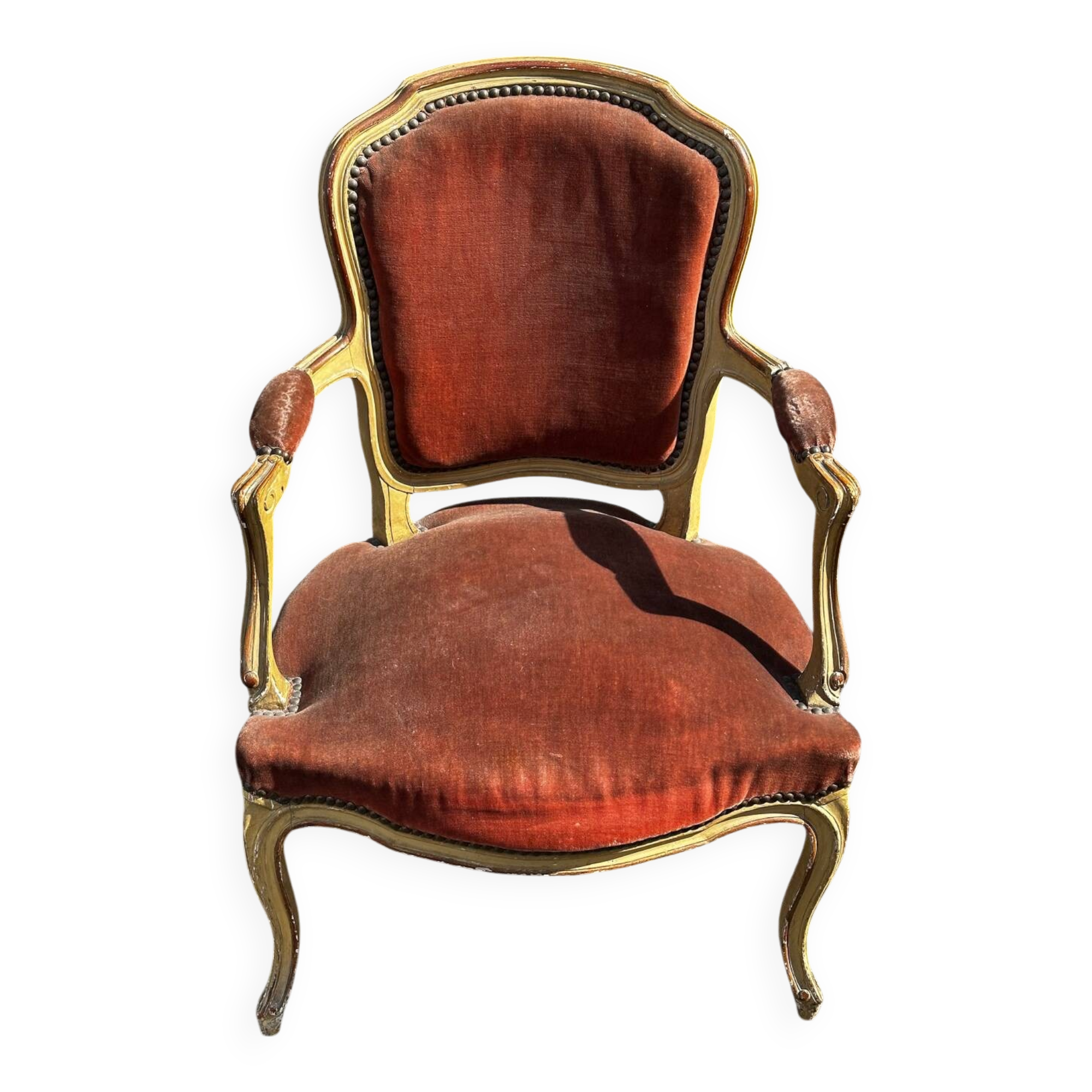 Louis XV cabriolet armchair, patinated wood and antique velvet.