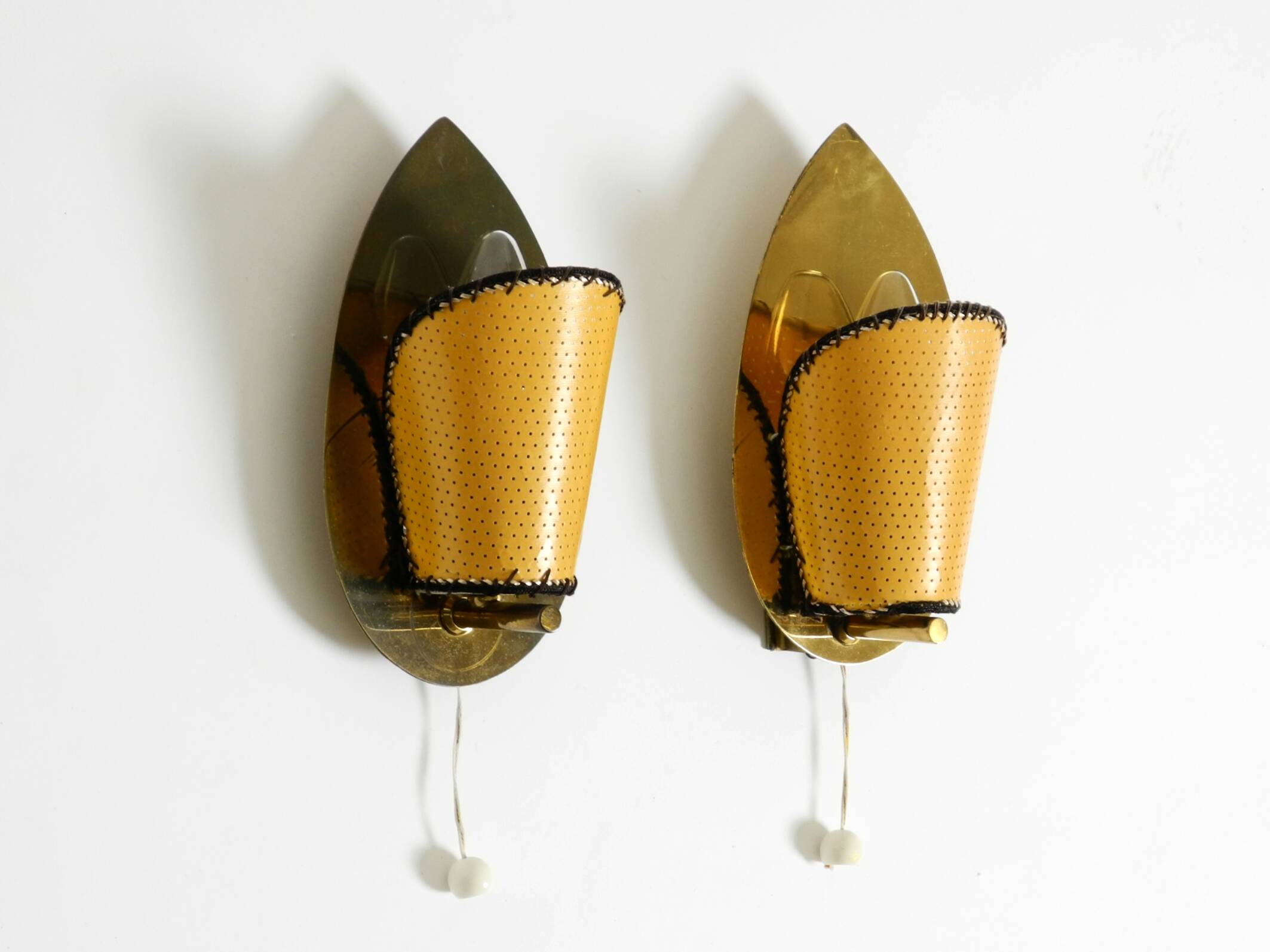 Two enchanting original Mid Century Modern brass wall lamps