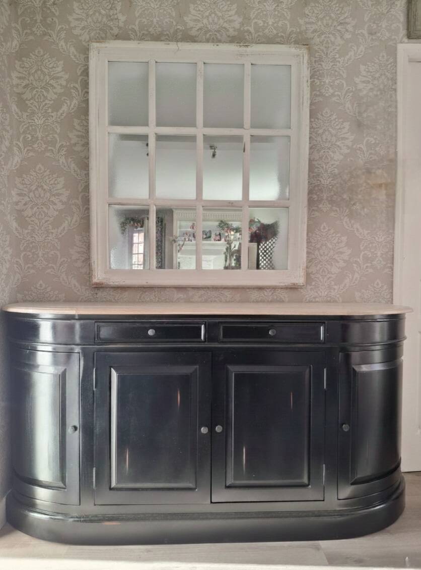 Black sideboard with curved sides and wooden top