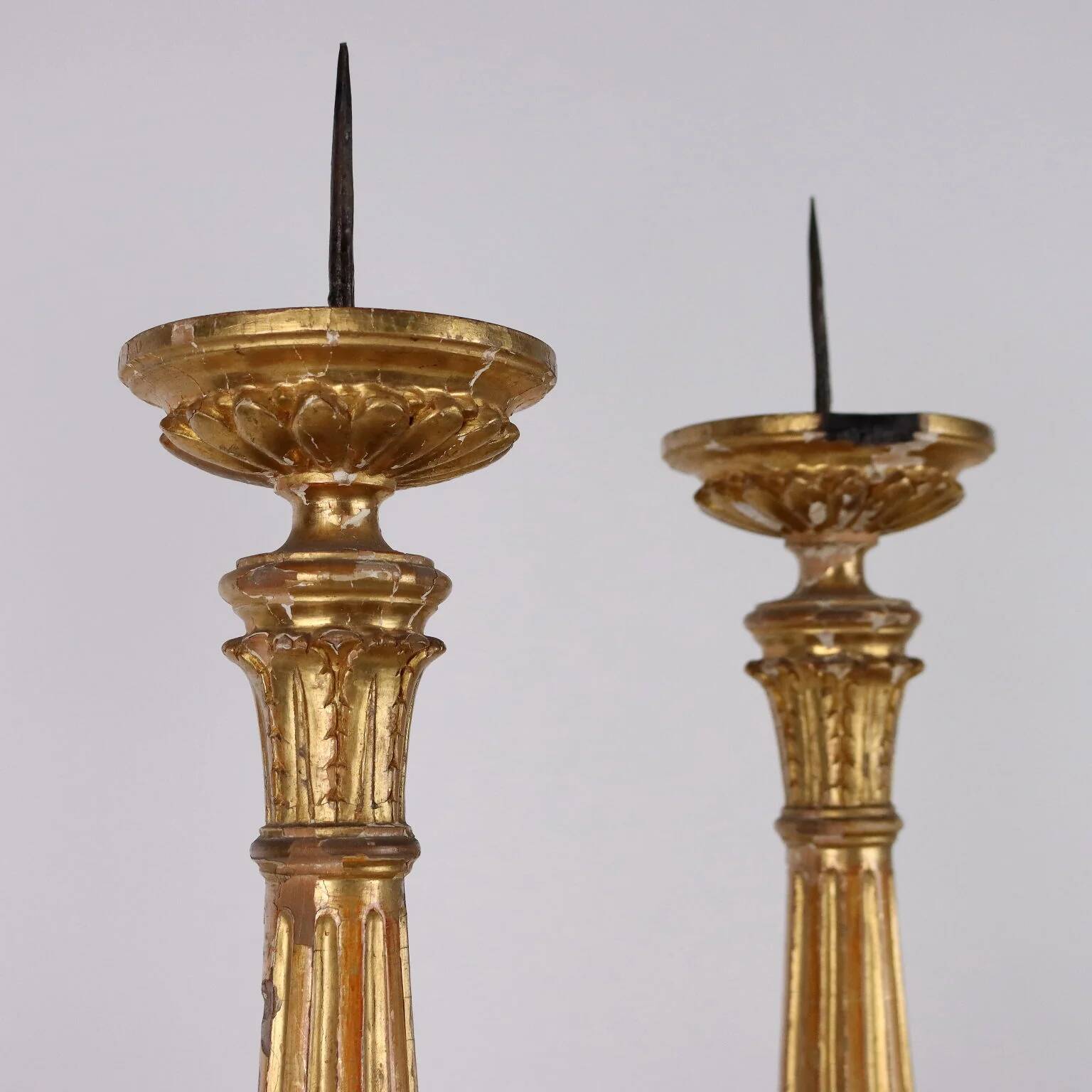 Pair of antique Empire candlesticks in wood, Europe, early 19th century.