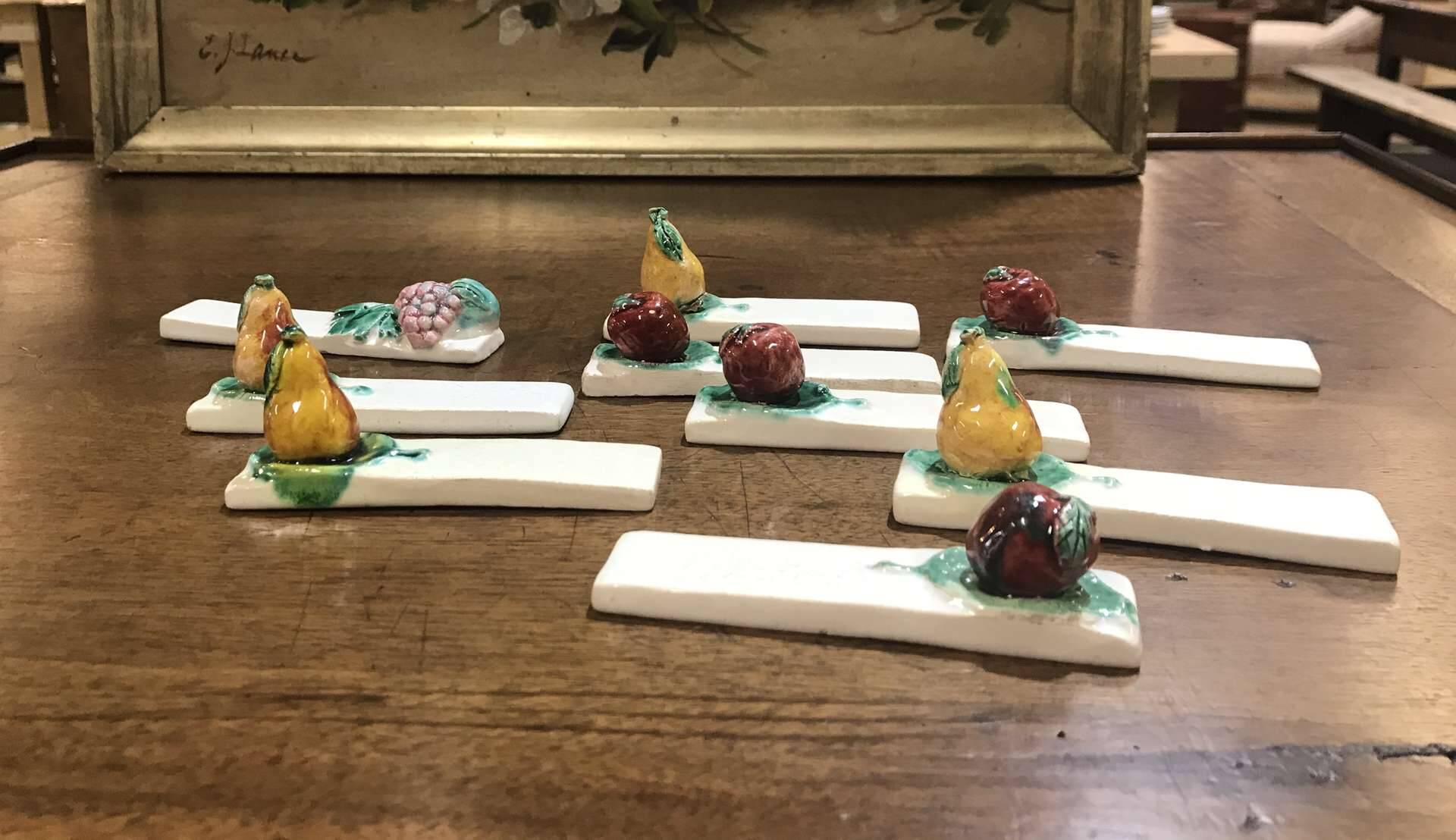 Set of 9 fruit-decorated knife rests from the 1930s.