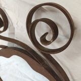 Pair of wrought iron sun mirrors