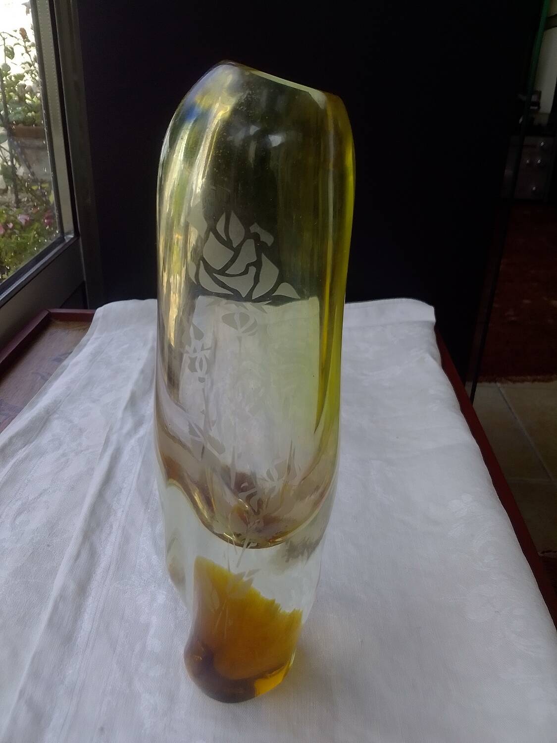 Amber-colored engraved crystal vase