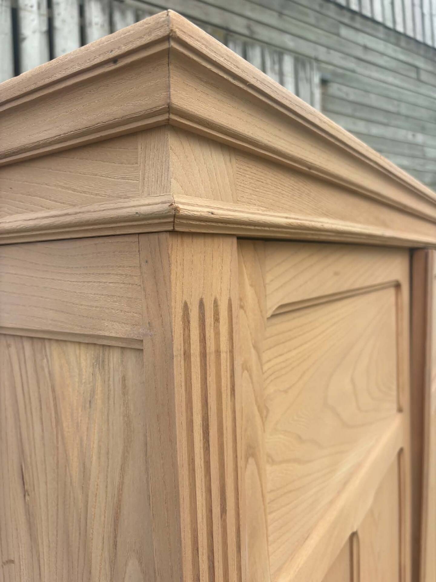 Large antique wardrobe in raw wood
