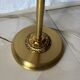 Floor lamp, brass torchère with neoclassical decoration, Empire style.