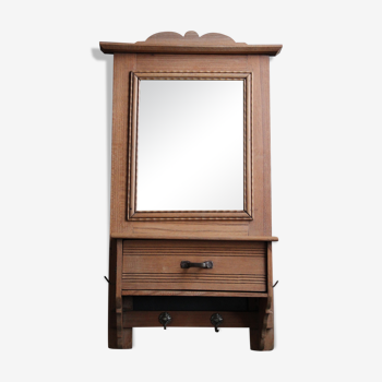 Toilet or pharmacy cabinet with old mirror
