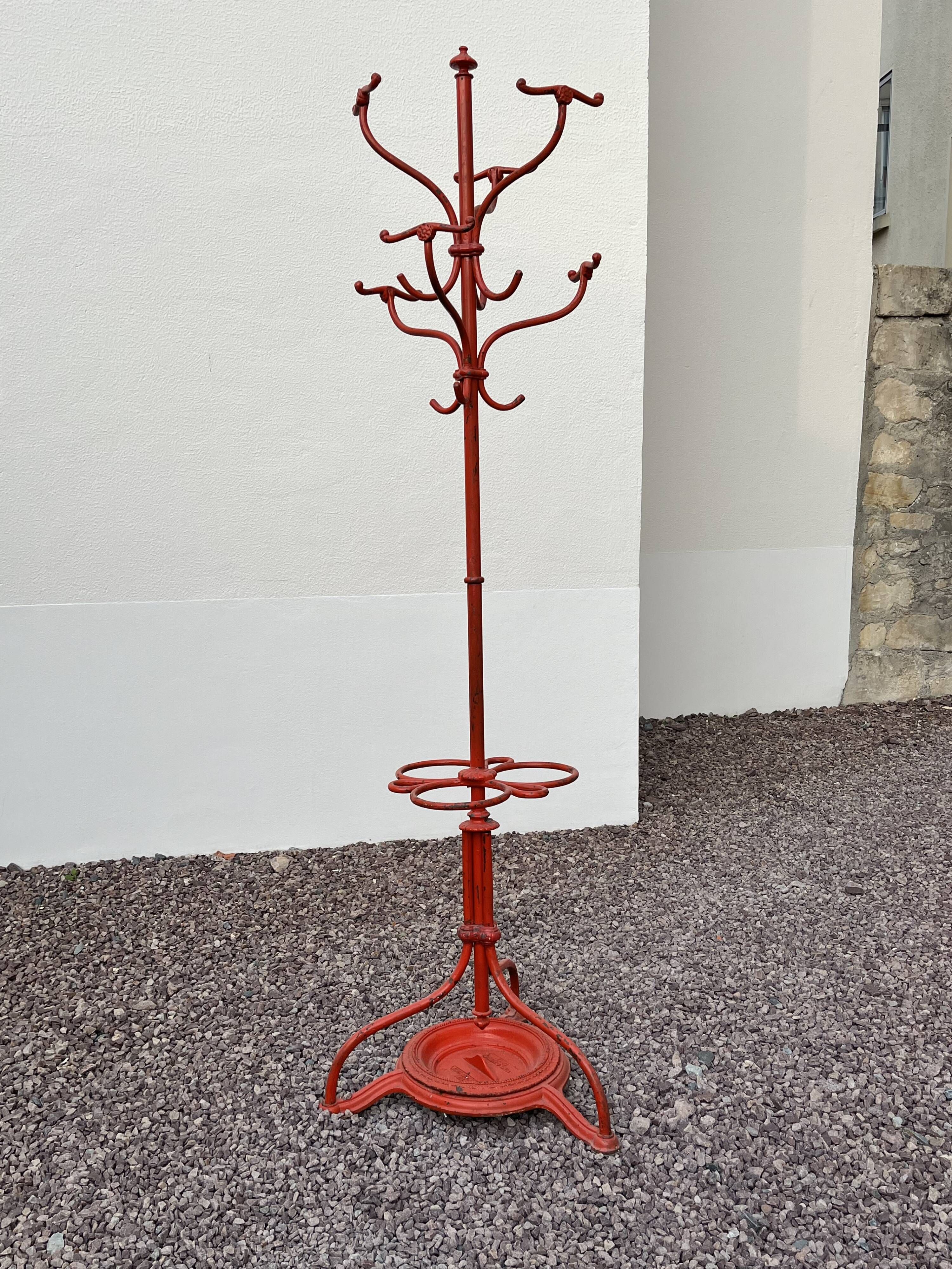 A freestanding coat rack by Hynek Gottwald