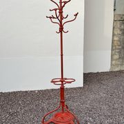 A freestanding coat rack by Hynek Gottwald