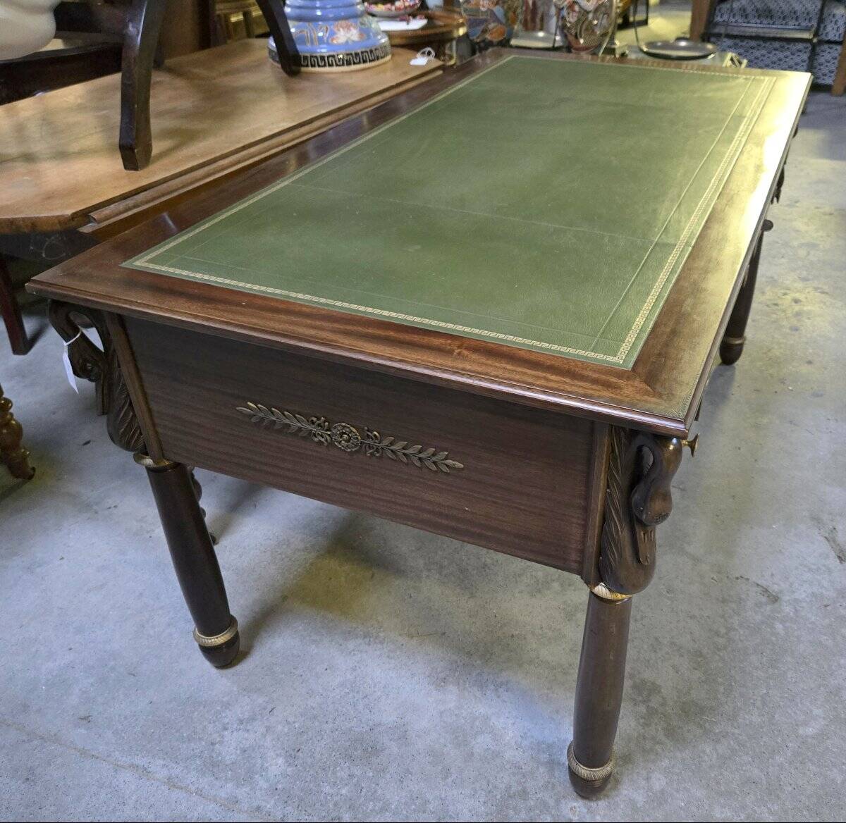 Empire-style minister's desk with swan necks in mahogany.