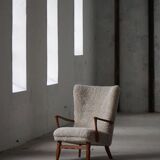 Viggo Boesen, high-back chair in oak and shearling lambskin, modern Danish design, 1950s.