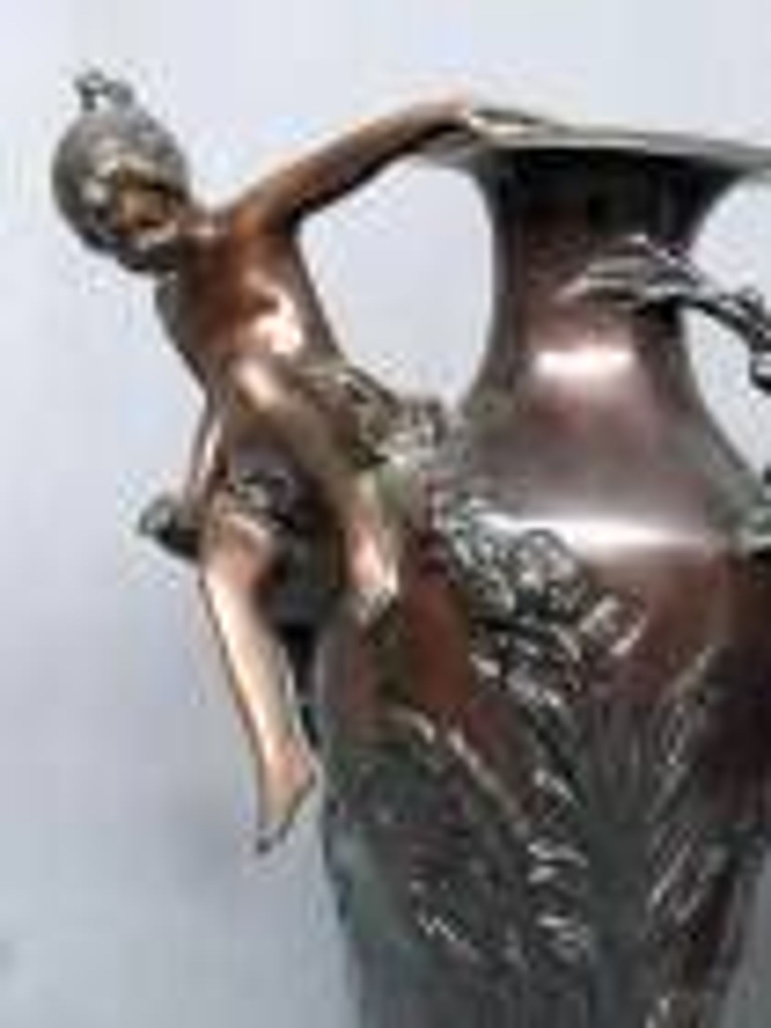 Pair of Art Nouveau vases in solid bronze.