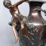 Pair of Art Nouveau vases in solid bronze.