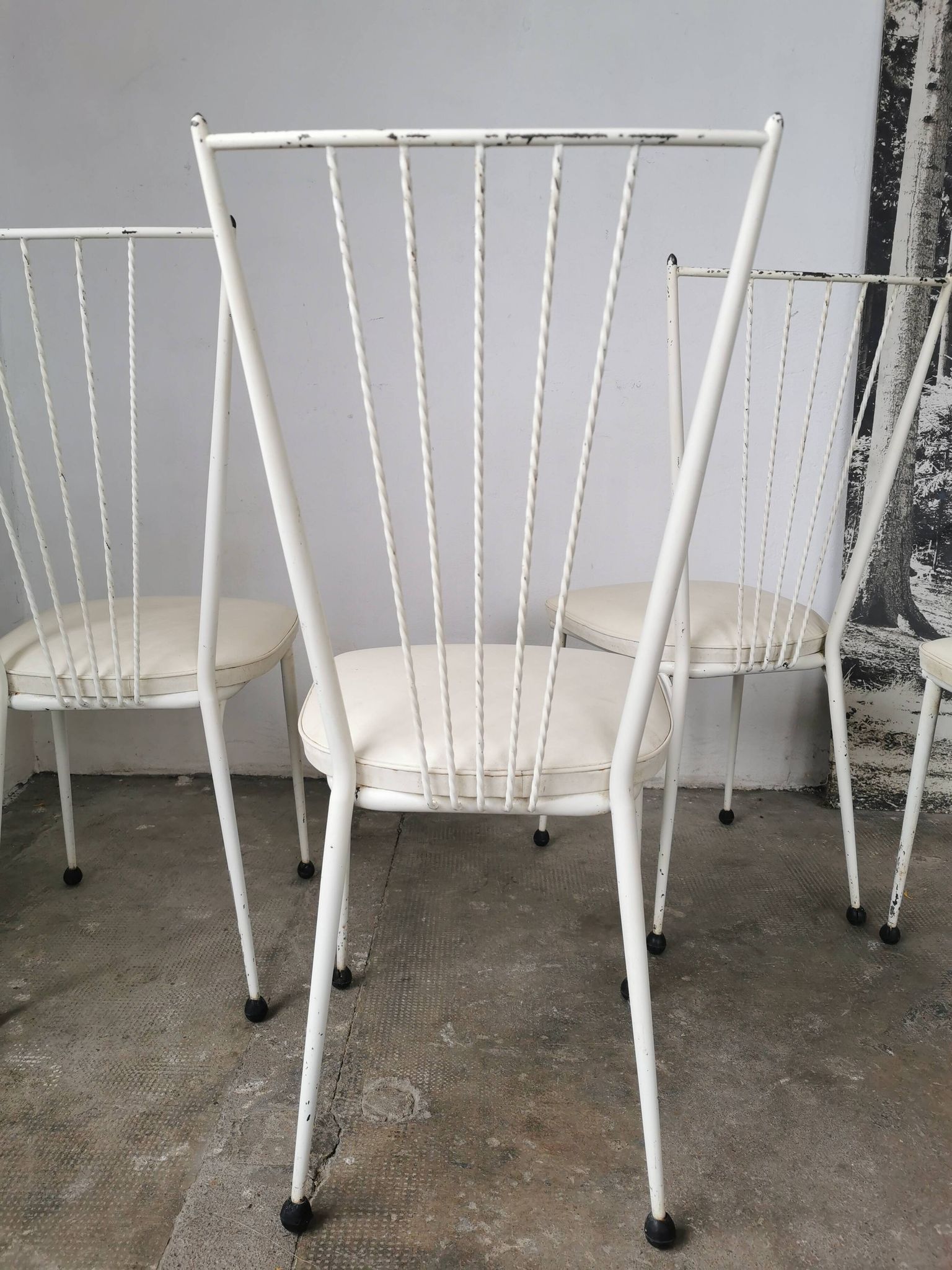 Set of 4 vintage chairs in metal and Skai