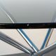 Designer smoked glass table, chrome Mikado base, vintage 1970