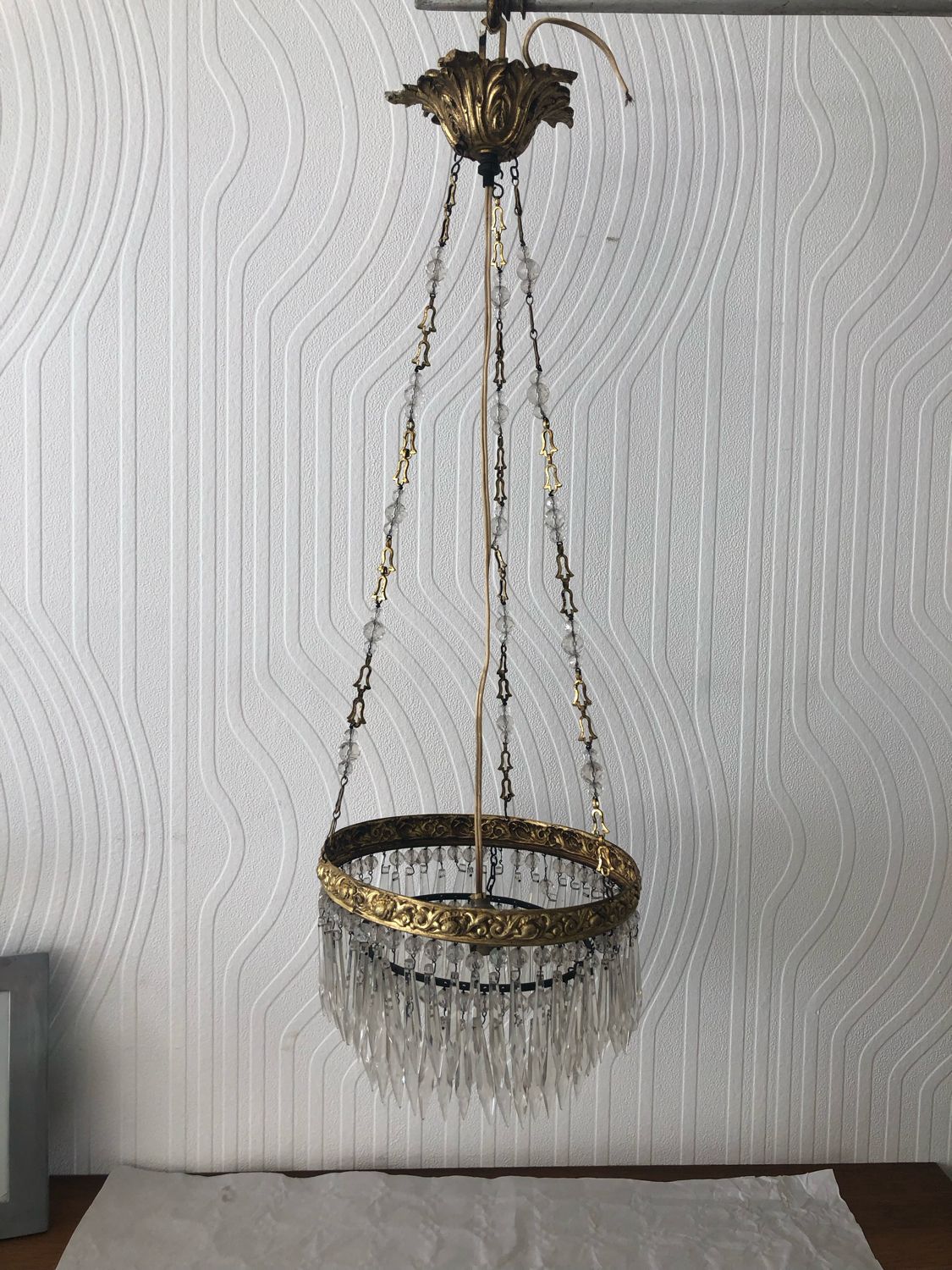 Vintage tassel chandelier has 2 glass and brass crowns