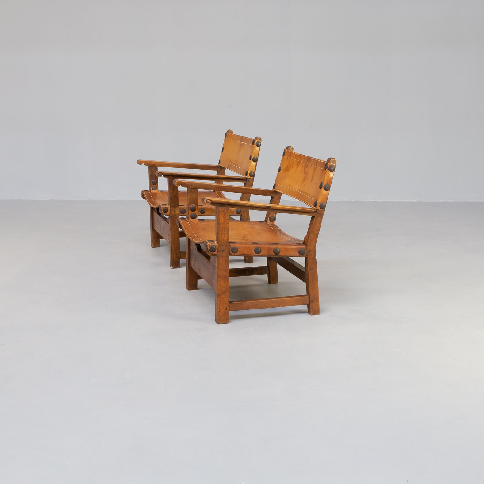 50s oak brutalist spanish chair with saddle leather