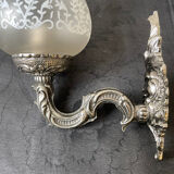 Pair of frosted glass globe wall lights from the early 20th century