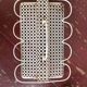 Perforated metal glass basket
