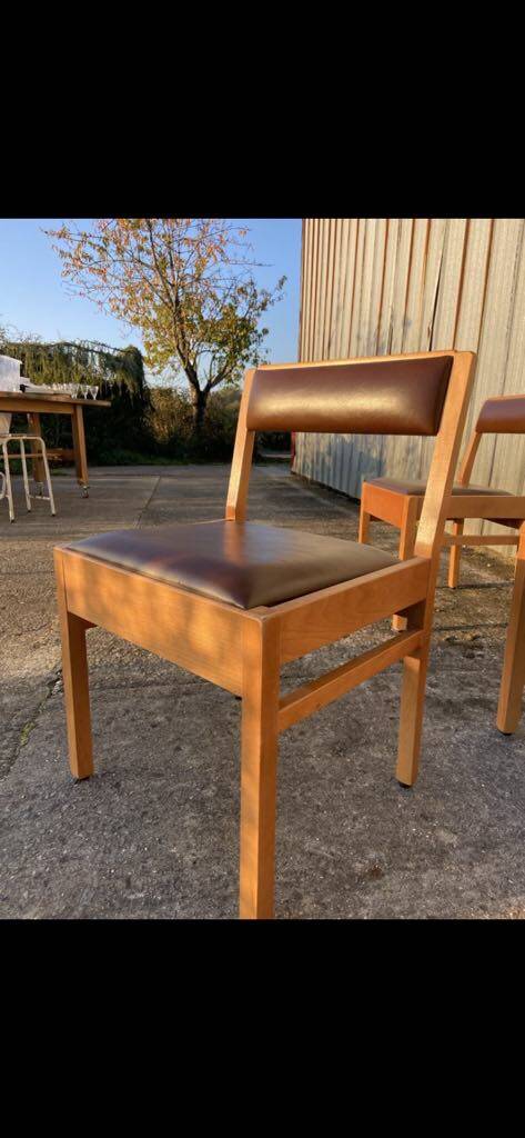 6 wooden chairs and faux leather