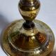 Duo of solid brass and gold metal candle holders worked old