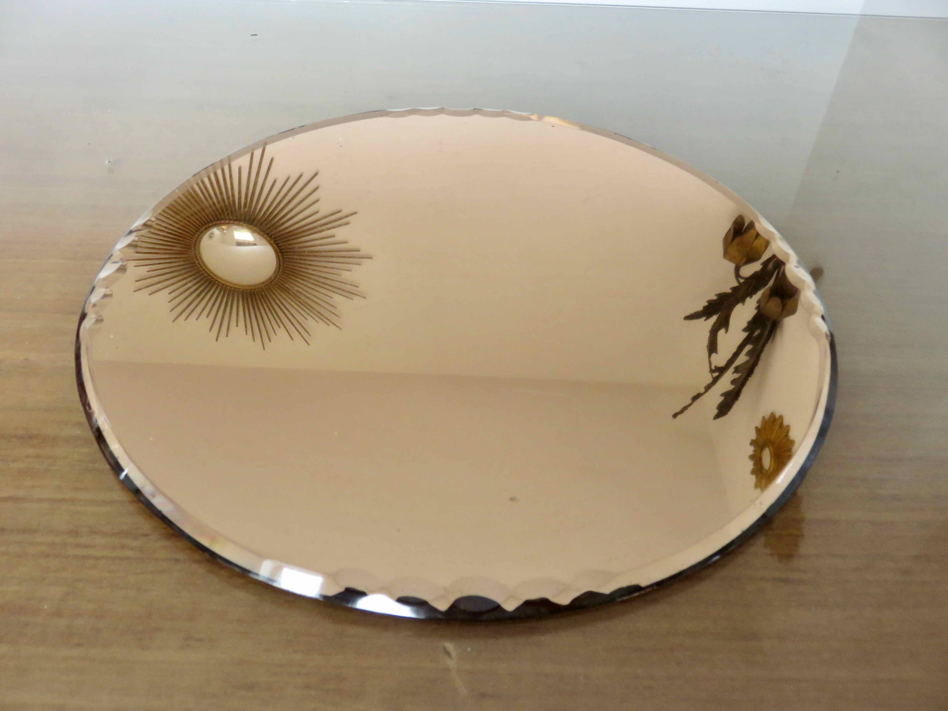 Round beveled amber pink mirror