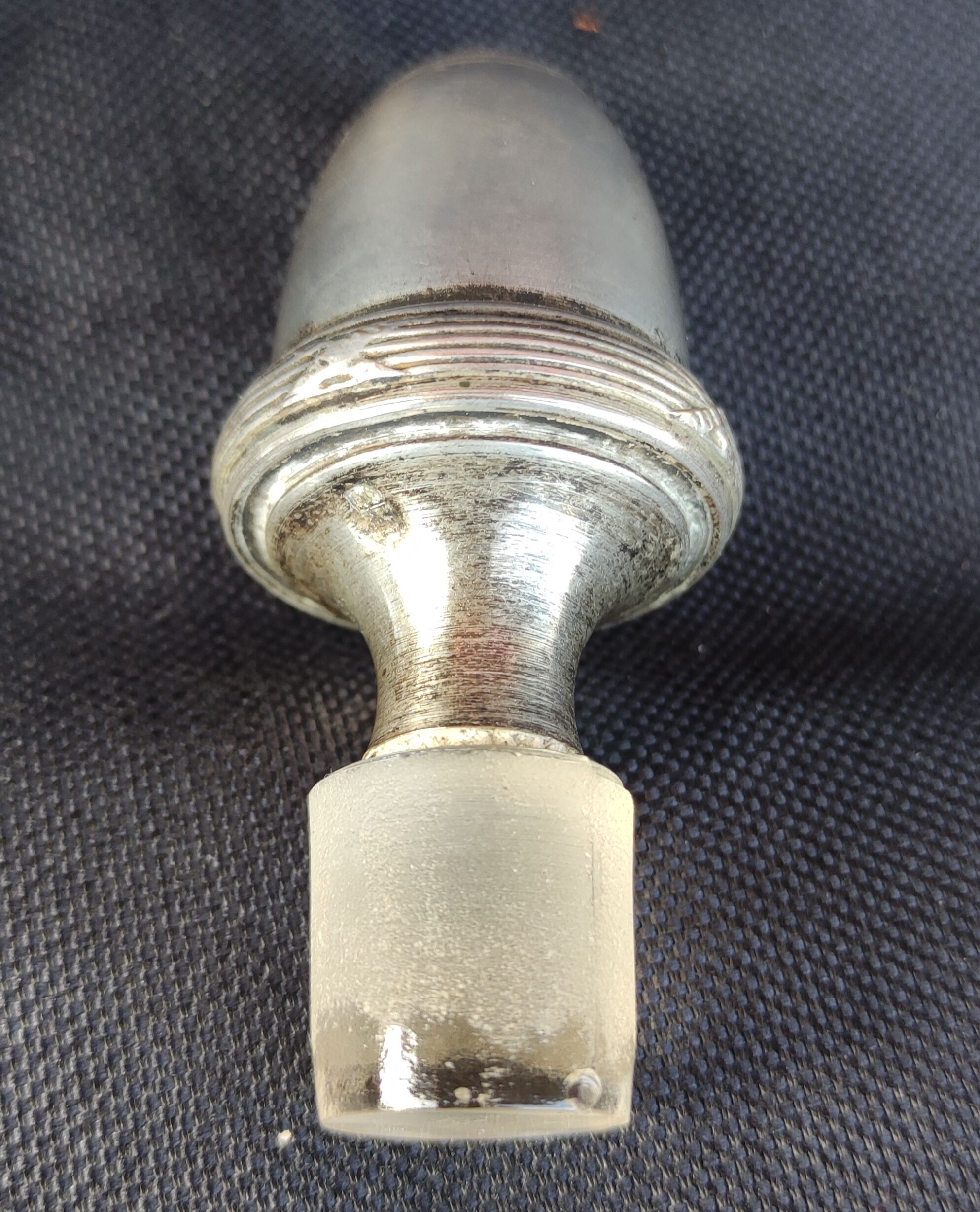Old silver metal carafon
