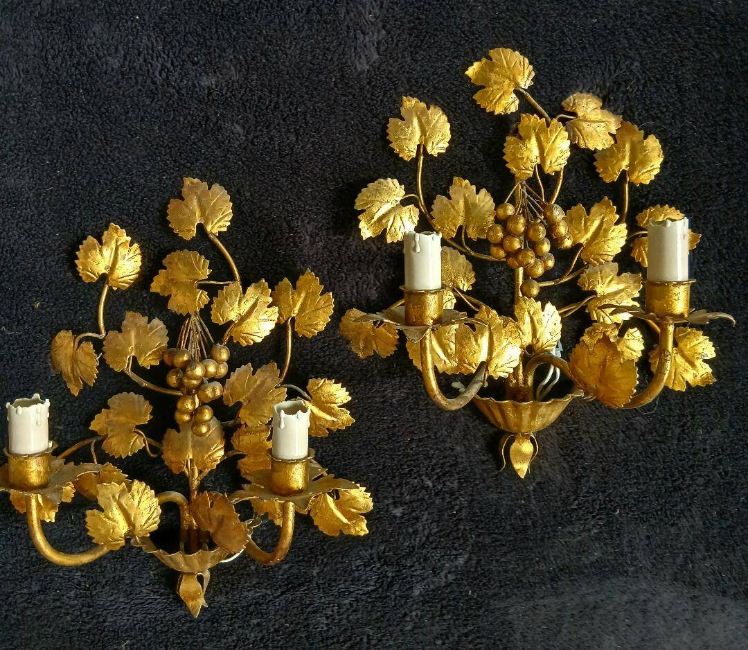 Stunning vintage wall lights in gilded iron with vine and grape decor from Italy.