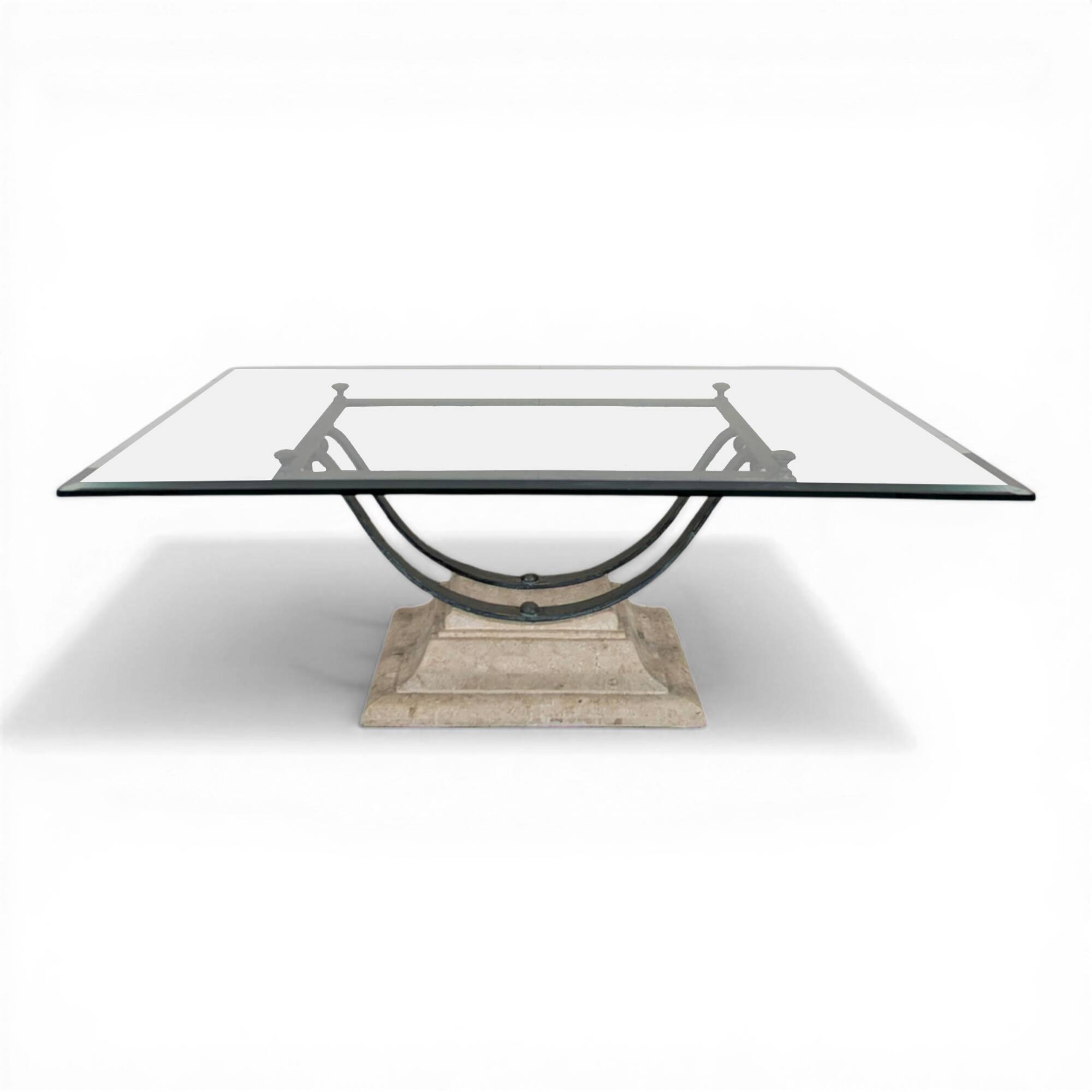 1980s coffee table with a travertine style and glass top.