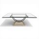 1980s coffee table with a travertine style and glass top.