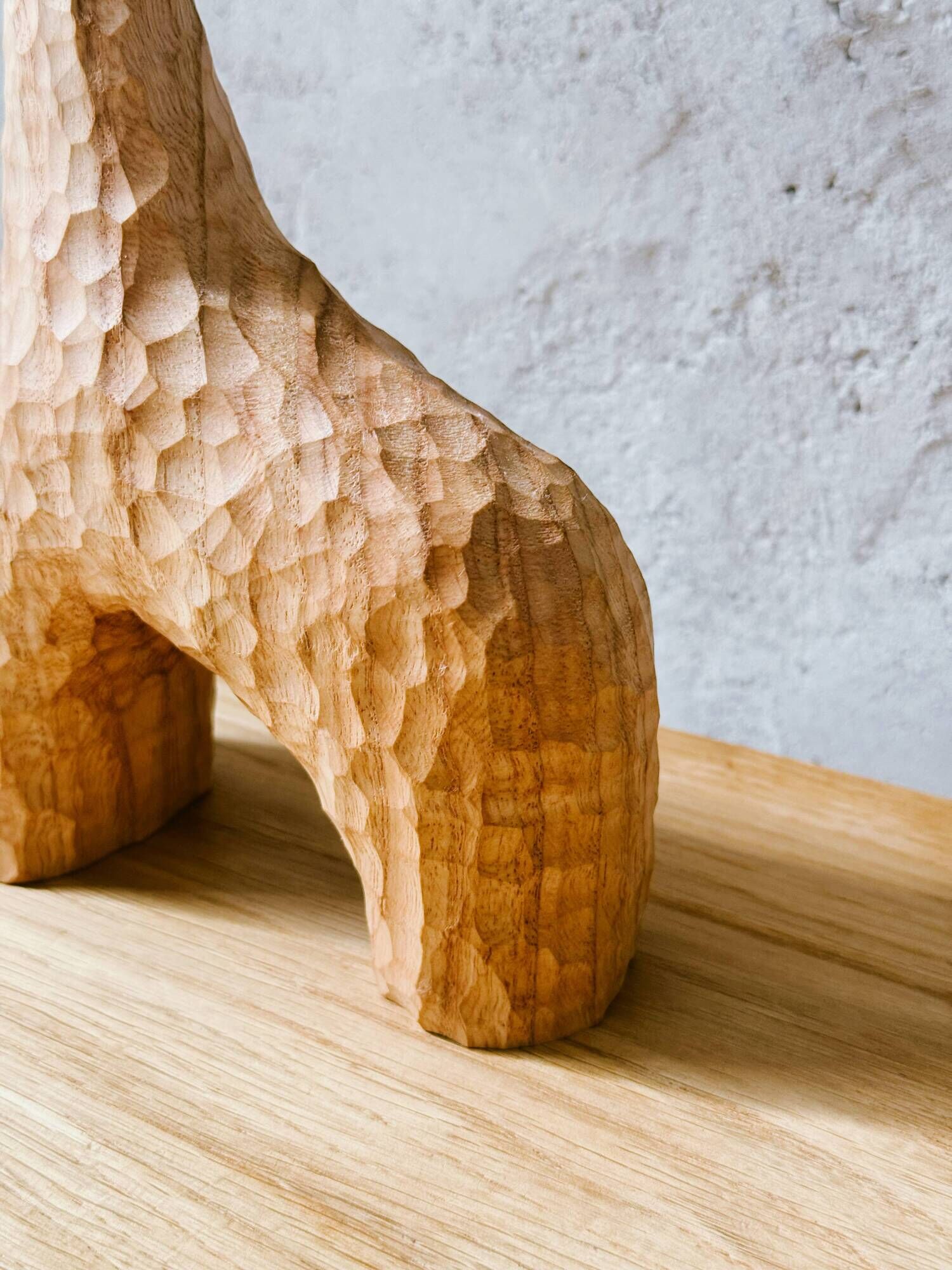 Hand-carved soliflore vase in solid chestnut wood.